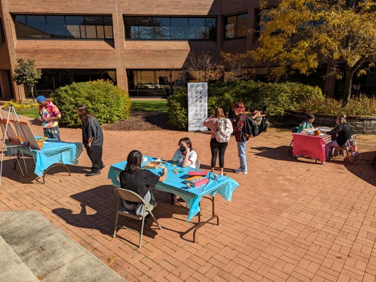 Students learning about fall holidays and enjoying the weather