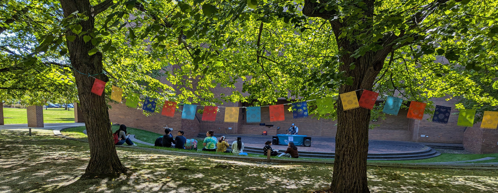 Courtyard view outside of students enjoying lunch