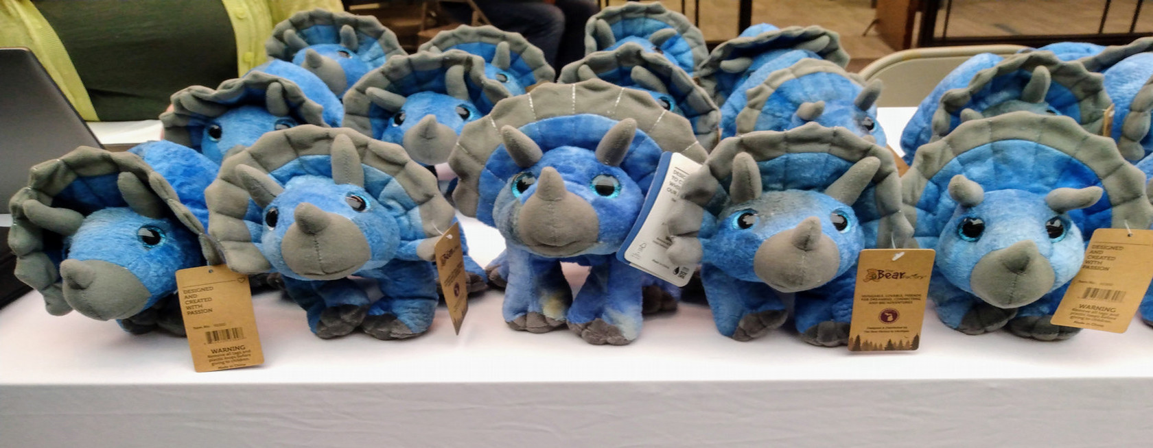 Build-a-Triceratops stuffed animals on table