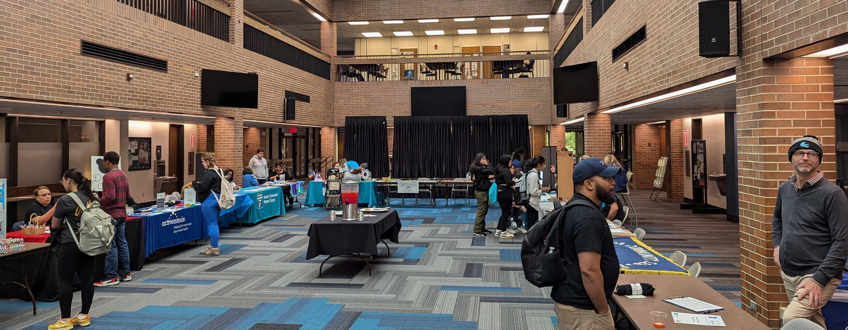 Involvement Fair with info tables and students, faculty and staff attending