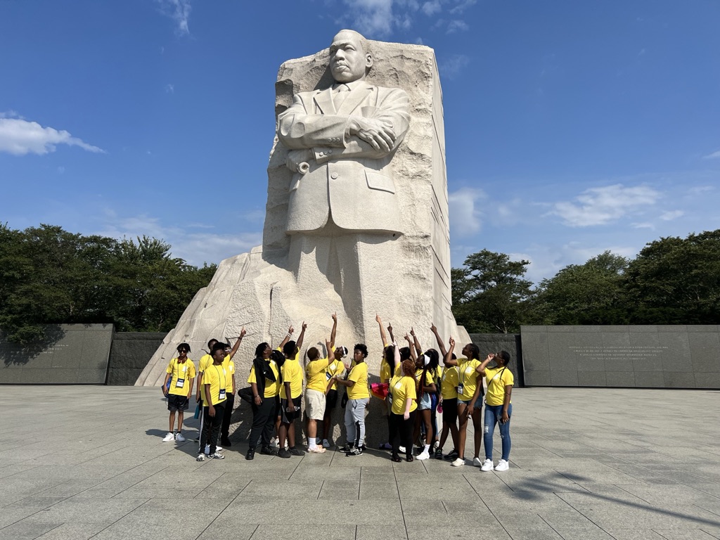 Picture of students in front of the Martin Luther King, Jr. Memorial during the 2023 Summer trip to Washington, DC. 