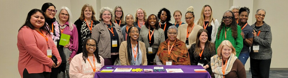 Women in Transition lined up in group photo