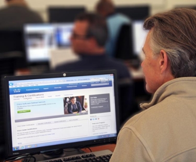 Man in front of a laptop