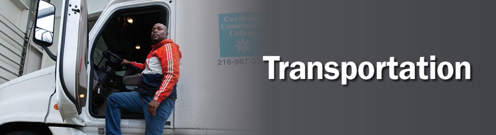 Workforce training banner image with a man standing on the steps of the door of a semi-truck with the word transportation on a gray gradient background.
