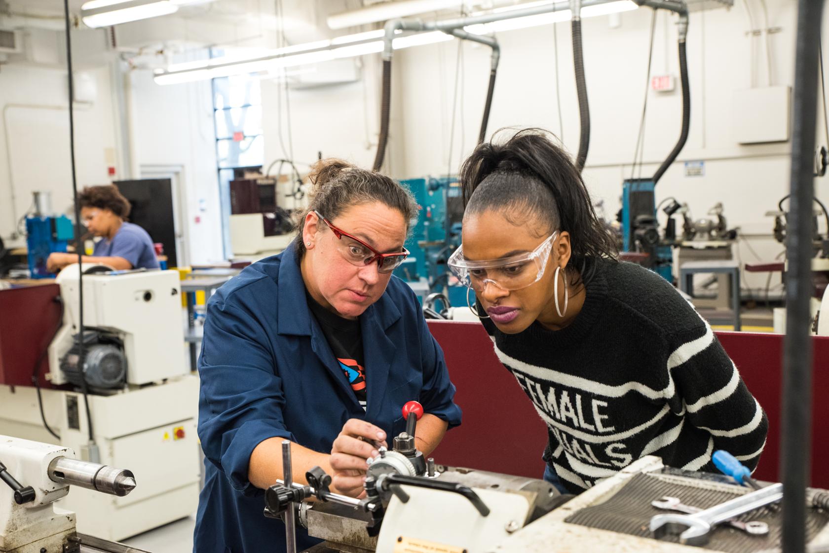 female instructor teaching a female student