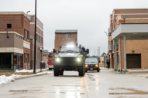 Vehicles on village street