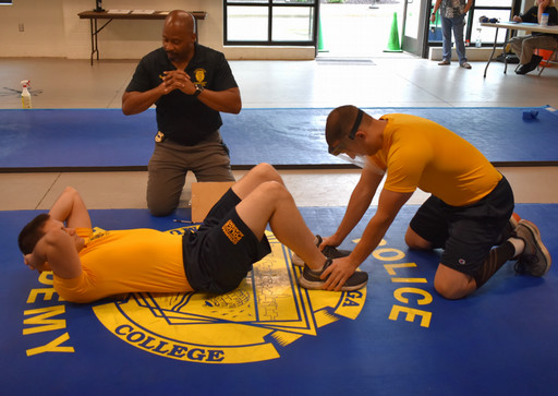 cadets preparing for situps